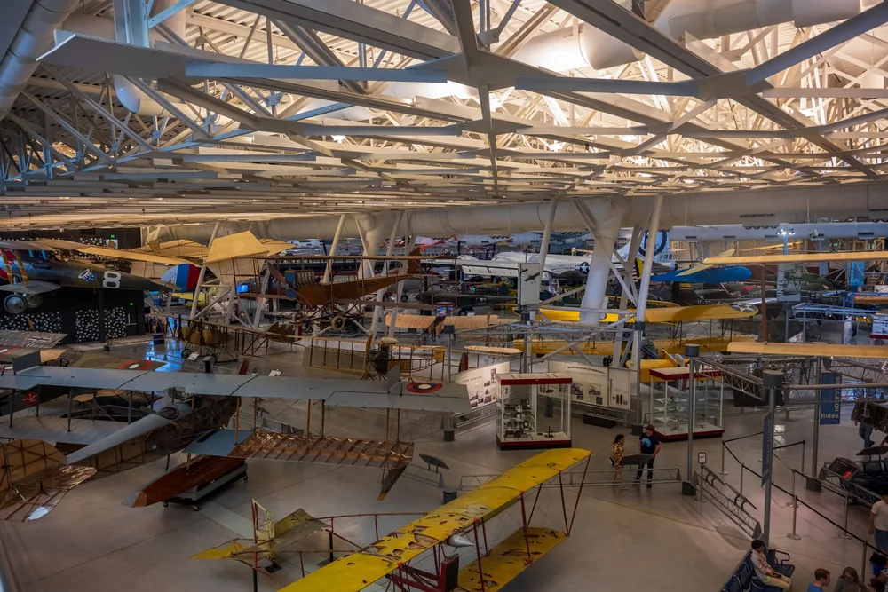 Museum hall with historic aircraft on display