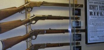 Winchester Historic Firearms Museum display showing rifles and memorabilia